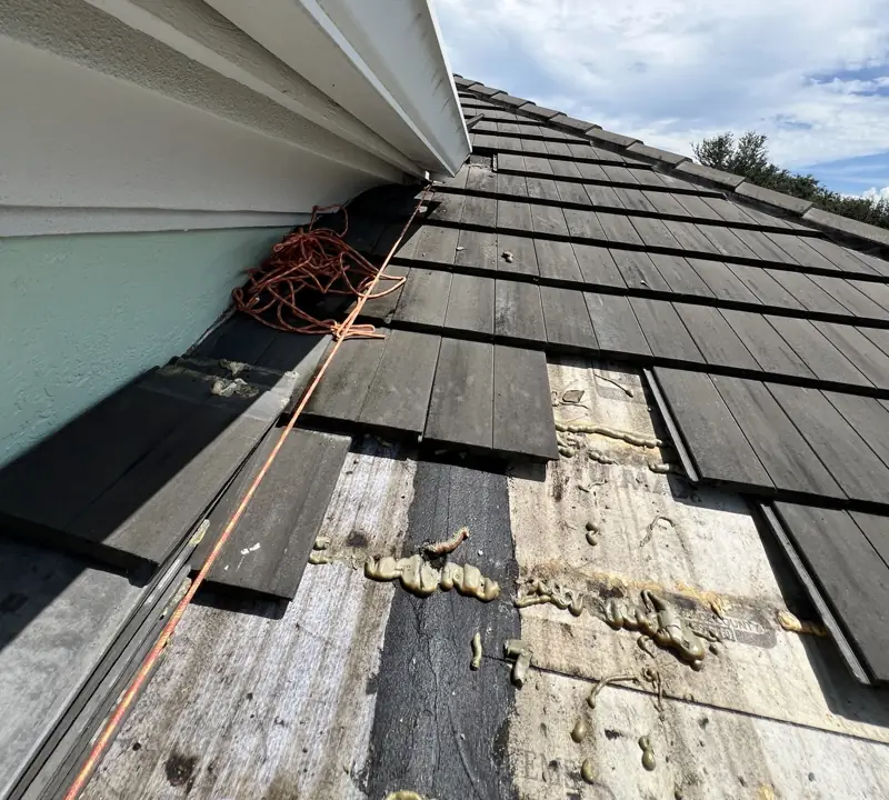 Storm damage documented before repair by Epoch Roofing in Naples, FL