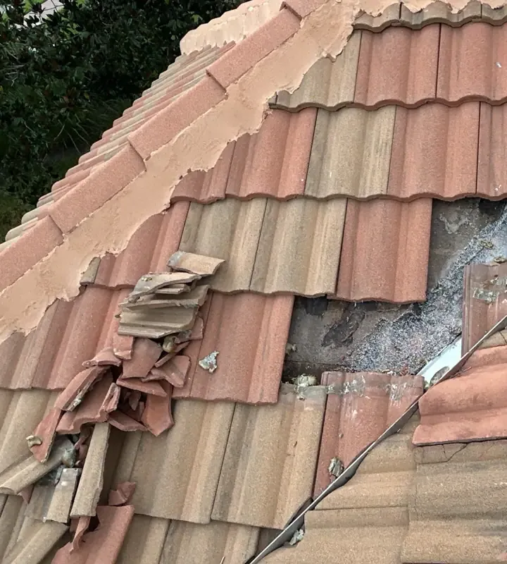Storm damage documented before repair by Epoch Roofing in Sarasota, FL