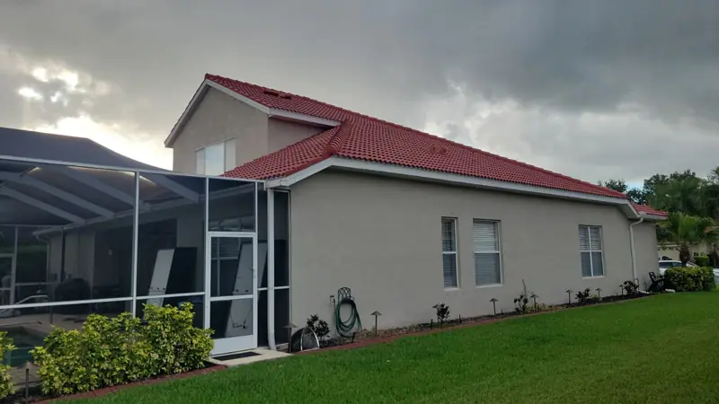 New red concrete tile roof completed by Epoch Roofing in Bradenton, FL